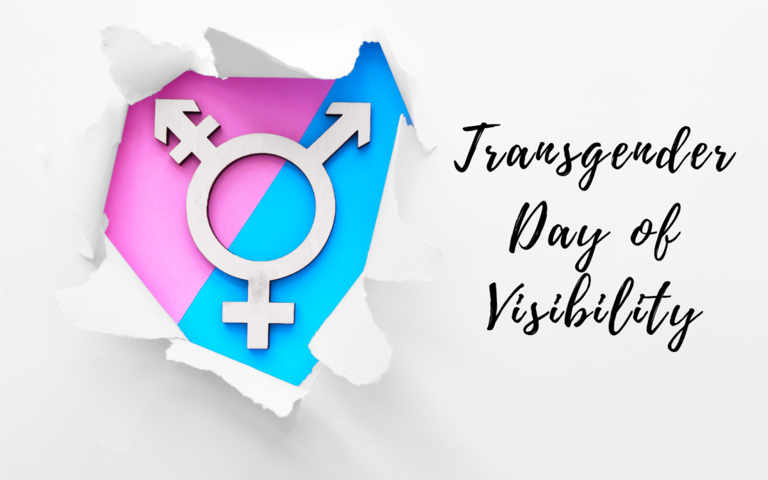 Transgender pride emblem symbolizing transgender day of visibility, emerging through torn paper.