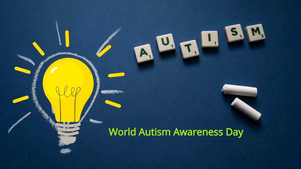 Lightbulb drawing with rays and "autism" spelled out in letter tiles on a blue background, symbolizing awareness for world autism awareness day.